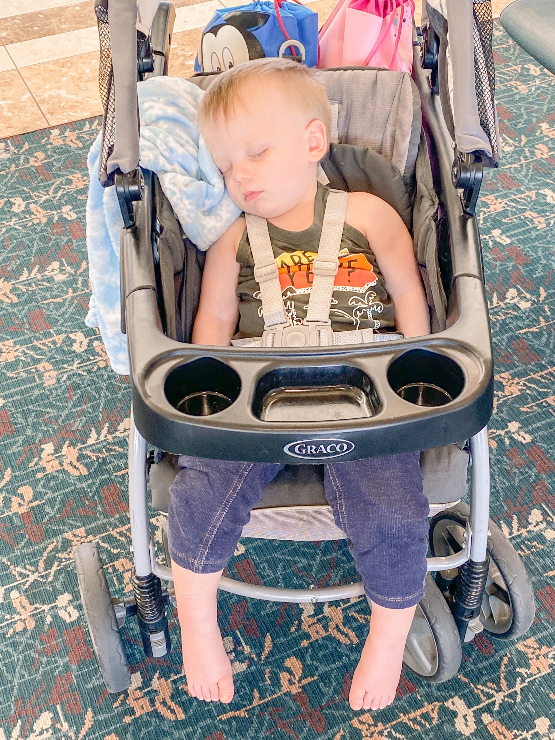  Sweet baby boy was so tired he didn’t even move when I put him into the stroller. 